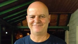 An image shows Charalambos Nicolaou.