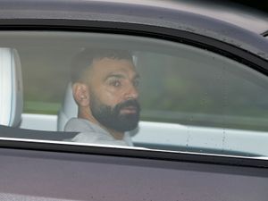 Supporting image for story: Mohamed Salah reports for training with future at Liverpool in question