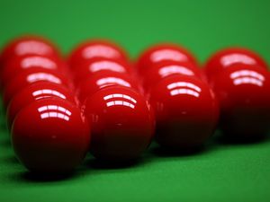 Supporting image for story: Two-year-old snooker prodigy secures two Guinness World Records for trick shots