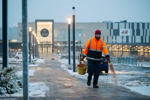 Workers out clearing routes at Telford Town Centre. Picture: Jamie Ricketts