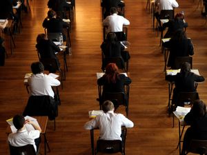 Supporting image for story: Top GCSE grades rise but key pass rate falls