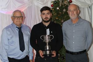 Senior Merit winner Harry Church flanked by Mike Humphries and (right) Paul Beer of competition sponsors Shropshire Vertidrain & Turf Services Ltd