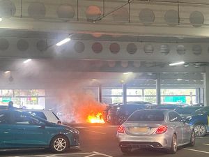 Supporting image for story: Watch: Fire and smoke rip through Sainsbury's car park as building evacuated following Wolverhampton three-vehicle fire