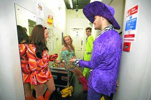 Dancers relax backstage.