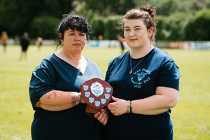 Rugby Match and Fun day in memory of Will Rogers, who was hit by a car and died last year. Pictured here is his Mother Mandy Oliver and Lydia Goldie holding his trophy..