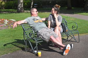 Kevin and Shelley Dunbar were caught enjoying the sun.