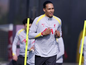 Virgil van Dijk runs during a training session