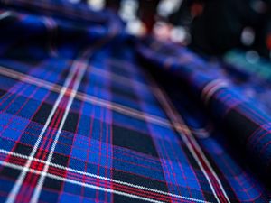 Supporting image for story: New tartan created for Interpol ahead of general assembly in Scotland