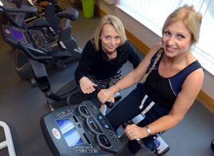 Suzanne also helps to train others. She is seen here, left, with gym member Zoe Woodruffe.
