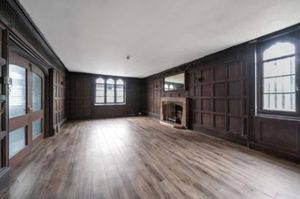 The snug, with oak panelling and a fireplace thought to date back to the 17th century