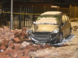 Supporting image for story: 11 pictures shows remains of building that partially collapsed in Wolverhampton as one man brought to safety