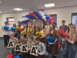 A selection of students who have received their results pictured with Holly Bembridge, Principal.