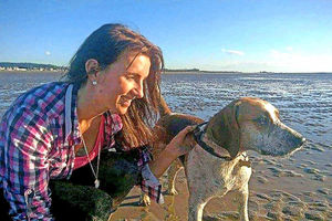 Olivia Spionkowska, 31, with the family dog Charlie