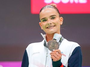 Supporting image for story: Telford's Alice Kinsella head over heels with medal