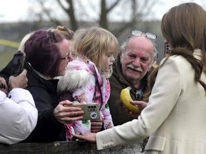 Supporting image for story: Kate takes time out to greet young fan on factory visit