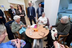 Care minister Stephen Kinnock chats with members of the knit and natter group at Katharine House Hospice, Stafford