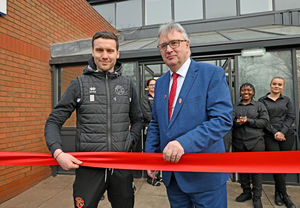 Leigh Pomlett with Walsall manager Mat Sadler