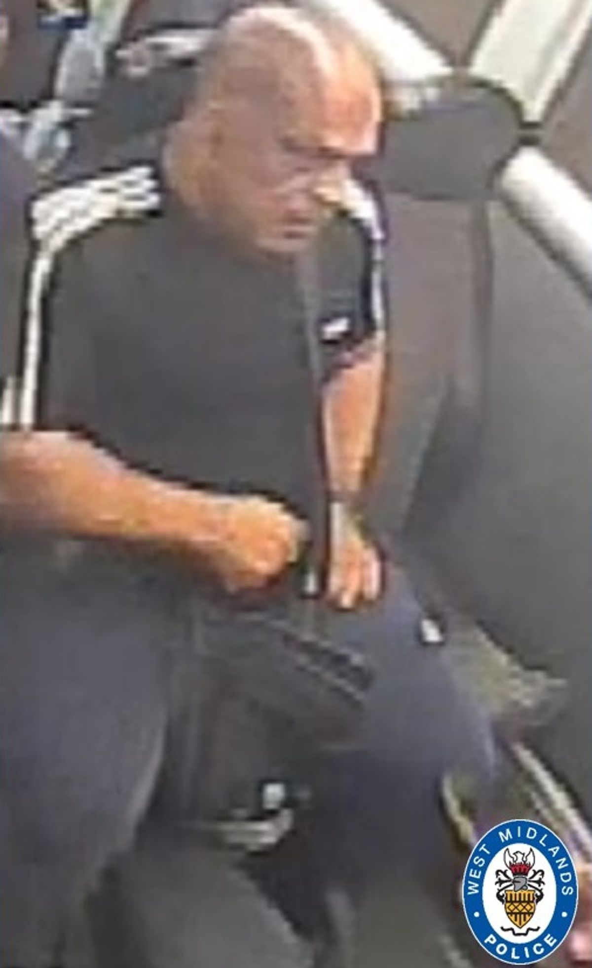 Image of man police seek after man repeatedly punched near Birmingham bus stop