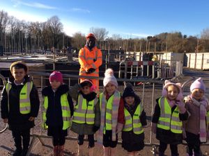Supporting image for story: Telford primary pupils explore construction careers and safety practices on building site visit
