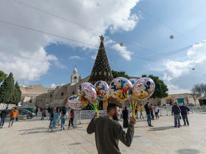 Supporting image for story: In Pictures: Christmas gets under way around the world after year of trials