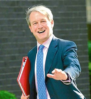 All smiles arriving for the first Cabinet meeting of the coalition government as Northern Ireland secretary