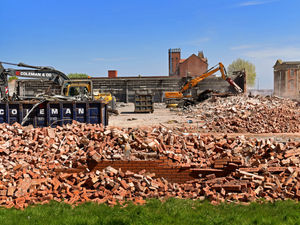 Supporting image for story: It’s a right royal view as hospital reappears during former bus depot demolition 