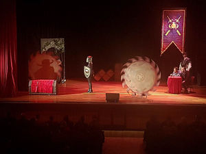 Claire avoids the spinning plates to claim her prize, the head of Pat Sharp. Pictures by: Wayne Beese