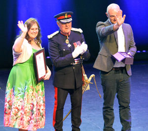 Jenna Wilkins and David March accept the award for Wolverhampton Samaritans