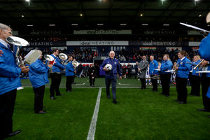Albion legend Tony 'Bomber' Brown - all-time record appearance maker and goalscorer - delivers the match ball on to a plinth ahead of kick-off against Derby.(Photo by Adam Fradgley/West Bromwich Albion FC via Getty Images)