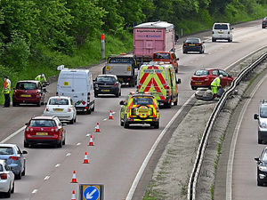 Supporting image for story: Crash between coaches and car blocks one lane of M54