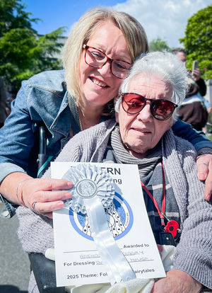 Friends of the Elderly Malvern's Activity Coordinator, Tina Ellenton, with Resident, May Goslin and the Silver Award Certificate