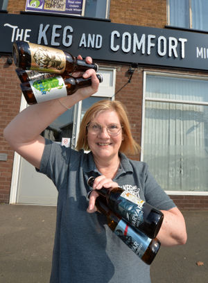Selling Ukrainian beer, and donating the profits to Ukraine, owner Louise Clive, at The Keg and Comfort micropub, Oxley, Wolverhampton