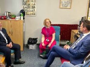 Minister Stephen Morgan chats with headmistress Helen Tomlinson