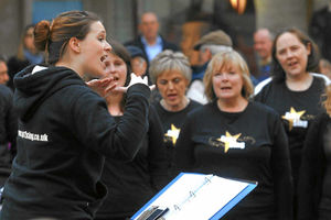 Beth Hippard, from Orleton, near Ludlow, leads the choir as they raise money for the British Lung Foundation