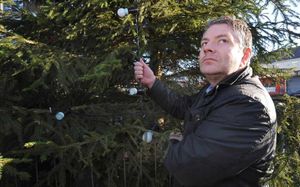 Councillor Jones inspects the damage