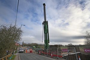  The giant crane being set up to move the beams.