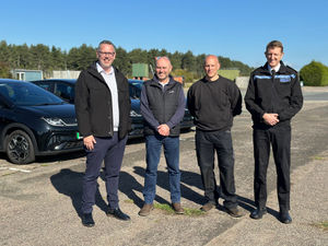 PCC John Campion, Dave Newbold West Mercia Police's Transport and Fleet Manager, Aaron Keay West Mercia Police's Workshop Supervisor, and Chief Constable Richard Cooper