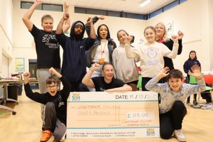 Flick Warner, of Slimming World, (centre front) with members of Lightmoor Village Youth Project.