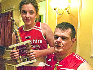 Supporting image for story: Family makes boxing history as Rob and Brydie pack a punch