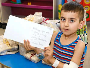 Supporting image for story: Liam Payne turns Santa with hundreds of presents for poorly children at New Cross Hospital
