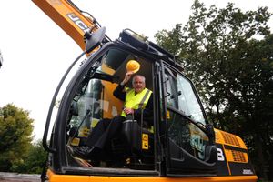 Pete Waterman gets started on the foundations of Dudley College's new Dudley Advance Engineering and Construction Centre in Priory Road, Dudley, in 2013