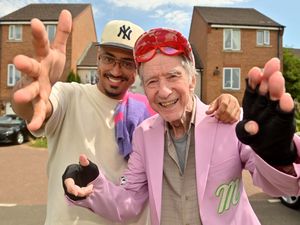 Supporting image for story: 'I never thought I would have fans': Dancing dad celebrates TikTok milestone with son