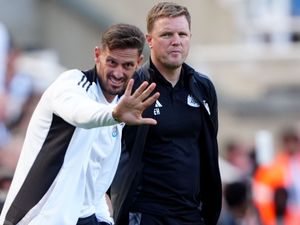 Jason Tindall puts his hand up with Eddie Howe looking on