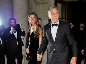 Supporting image for story: George Clooney plays photographer at star-studded charity event