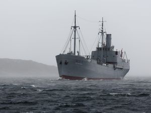 The Hestmanden at sea under grey skies