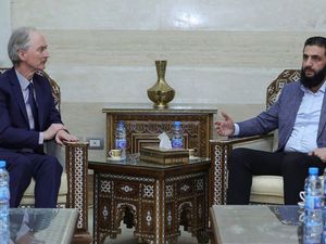 The leader of Hayat Tahrir al-Sham Ahmad al-Sharaa, (Abu Mohammed al-Golani), right, as he meets with United Nations’ special envoy to Syria, Geir Pederson, in Damascus