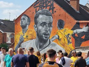 Supporting image for story: 'It's going to be there forever' - Fans flock to pay homage at new memorial mural of Diogo Jota in grounds of Wolves pub