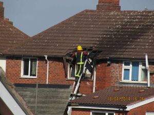 Firefighters tackle the blaze believed to have been started by fairy lights yesterday