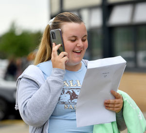 Pupils celebrate their GCSE results at Charlton School, Wellington