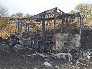 Supporting image for story: Aftermath of blaze which destroyed garage workshop